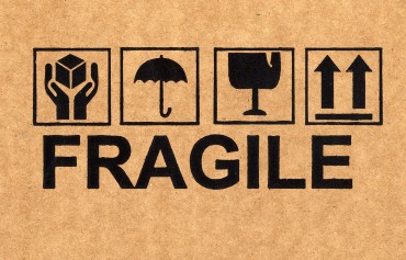 bigstock-Fragile-Symbol-On-Cardboard-4293008.jpg