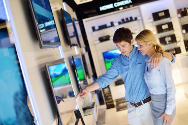bigstock-Young-couple-in-consumer-elect-36361138.jpg