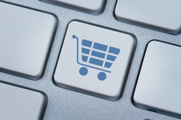 bigstock-Shopping-Cart-Symbol-At-The-Co-32516369.jpg