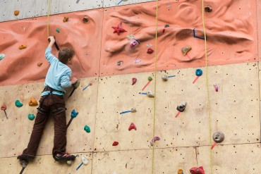 bigstock-Young-climber-rises-to-the-cli-45676168.jpg