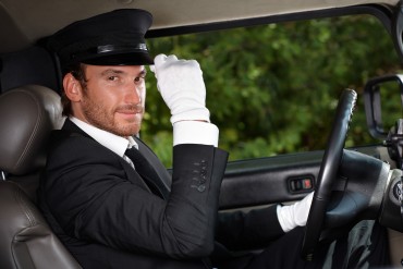 bigstock-Confident-chauffeur-sitting-in-29419352.jpg