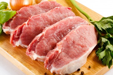bigstock-Raw-pork-on-cutting-board-and--38829337.jpg