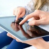 bigstock-Entertainment-With-Apple-Ipad-33125444.jpg