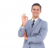 bigstock-Smiling-businessman-saying-ok--46873816.jpg