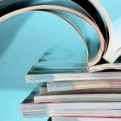 bigstock-stack-of-magazines-on-blue-bac-31793537.jpg