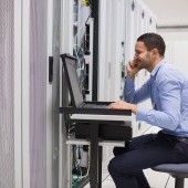 bigstock-Man-maintaining-the-servers-in-38647267.jpg