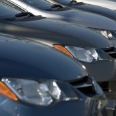 bigstock-A-lineup-of-new-cars-at-a-deal-18575579.jpg