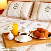 bigstock-Breakfast-On-Bed-In-A-Hotel-Ro-3068229.jpg