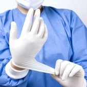 bigstock-doctor-putting-gloves-35504138.jpg