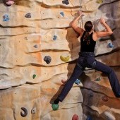 bigstock-active-young-woman-on-rock-wal-18885752.jpg