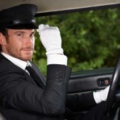 bigstock-Confident-chauffeur-sitting-in-29419352.jpg