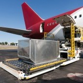 bigstock-Loading-Cargo-Plane-14916179.jpg