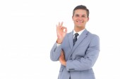 bigstock-Smiling-businessman-saying-ok--46873816.jpg