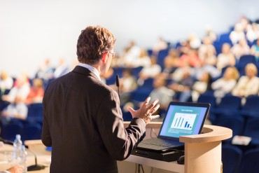 bigstock-Speaker-at-Business-Conference-119532005.jpg