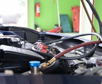 bigstock-Car-Refilling-Air-Condition-99477248.jpg
