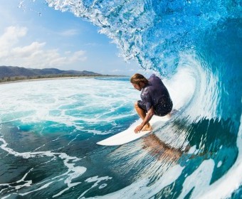 bigstock-Surfer-on-Blue-Ocean-Wave-in-t-38936167.jpg