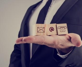 bigstock-Businessman-Holding-Three-Wood-83508854.jpg