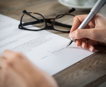 bigstock-Closeup-shot-of-a-woman-signin-104844545.jpg