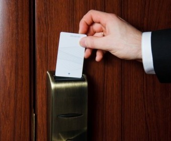 bigstock-Hand-Inserting-Card-Into-Elect-103657199.jpg