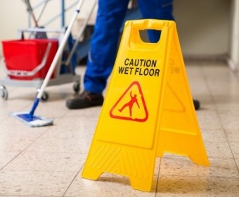 bigstock-Worker-Mopping-Floor-With-Wet--102667850.jpg