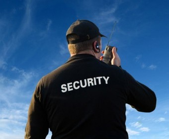 bigstock-back-of-a-security-guard-45501745.jpg