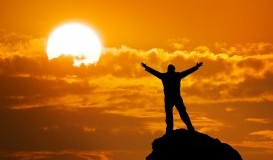 bigstock-Man-on-peak-of-mountain-Conce-38652742.jpg