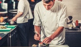 bigstock-male-cooks-preparing-sushi-in--116691095.jpg