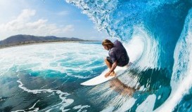 bigstock-Surfer-on-Blue-Ocean-Wave-in-t-38936167.jpg