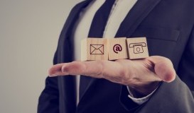 bigstock-Businessman-Holding-Three-Wood-83508854.jpg