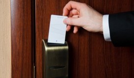 bigstock-Hand-Inserting-Card-Into-Elect-103657199.jpg