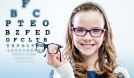 bigstock-Girl-Holding-Glasses-With-Test-85465427.jpg