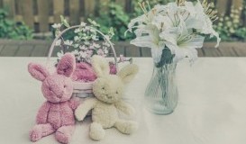bigstock-Plush-Easter-Bunnies-With-Bask-82817117.jpg