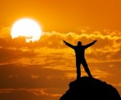 bigstock-Man-on-peak-of-mountain-Conce-38652742.jpg