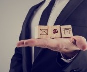 bigstock-Businessman-Holding-Three-Wood-83508854.jpg