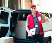 bigstock-Courier-Delivering-Package-By--99277757.jpg
