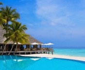 bigstock-Cafe-And-Pool-On-A-Tropical-Be-5626875.jpg