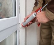 bigstock-Person-Applying-Silicone-Seala-96698300.jpg