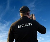 bigstock-back-of-a-security-guard-45501745.jpg